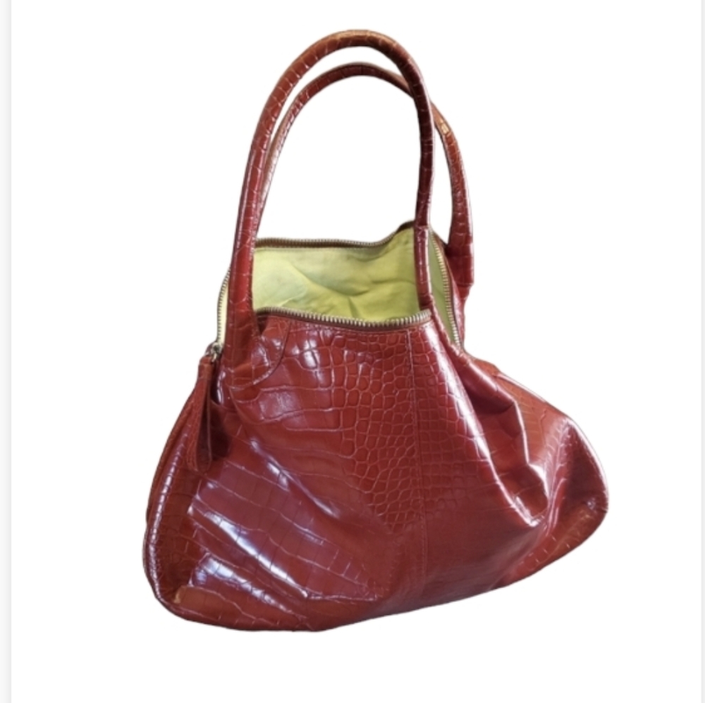 Donna Dixon red crocodile print purse
